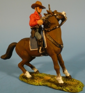 Cowboy mit 2 Revolvern zu Pferd