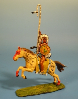 Indianerhuptling mit Skalpstange und Schild