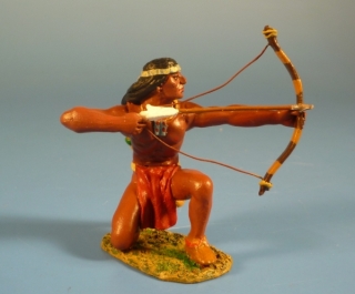 Indianer mit Pfeil und Bogen kniend nach links schieend