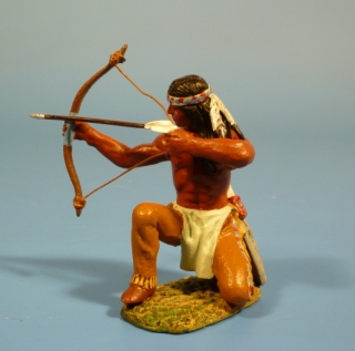 Indianer mit Pfeil und Bogen kniend nach rechts schieend