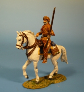 Trapper zu Pferd Gewehr links haltend