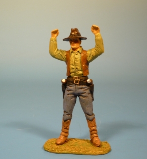 Cowboy H�nde hoch haltend