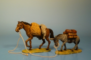 Pferd und Esel mit Beute