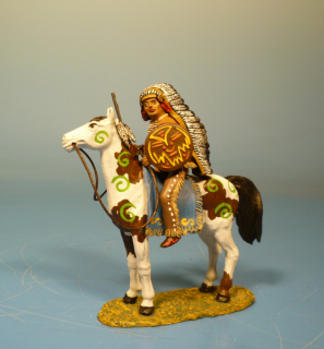Indianer zu Pferd mit Gewehr und Schild
