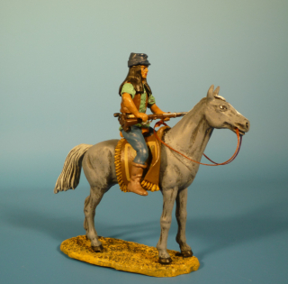 Apache zu Pferd mit Gewehr